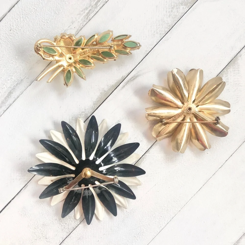 Set of three Vintage Metal and Rhinestone Costume Jewelry Floral Brooches